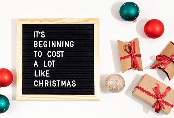 holiday spending quote sign