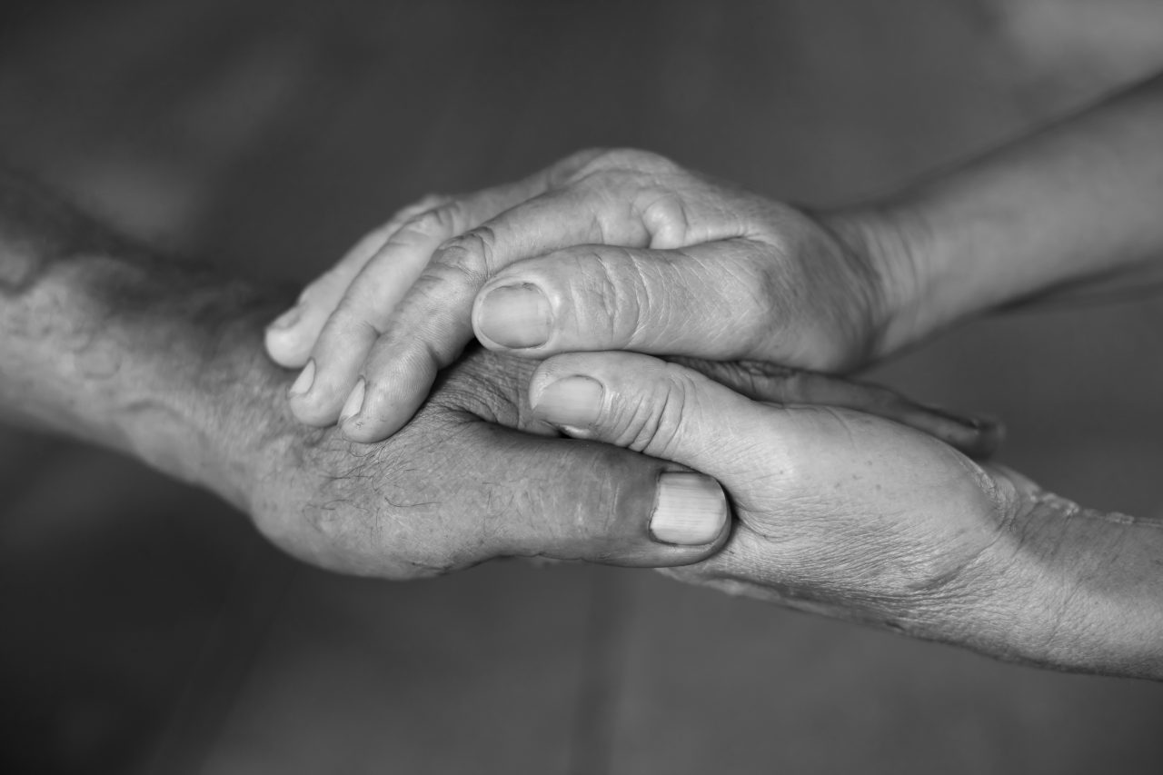 hands holding, therapy support for grief