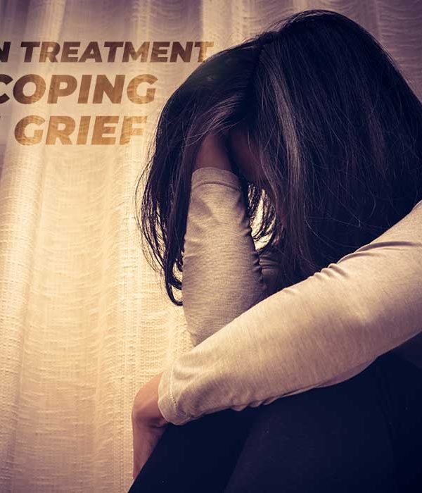 depressed women sitting in the dark room, alone, sadness, dealing with grief