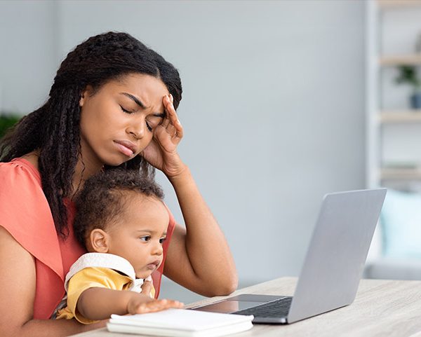 single mom with caregiving stress