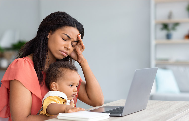 single mom with caregiving stress