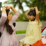 A mom and daughter playing.