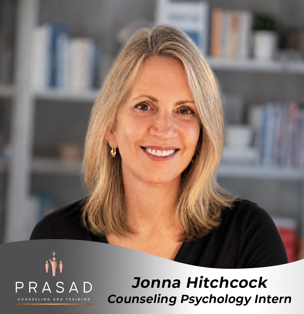 PrasadCounselingandTraining-Jonna-Hitchcock-Headshot Headshot of Jonna with a company banner.