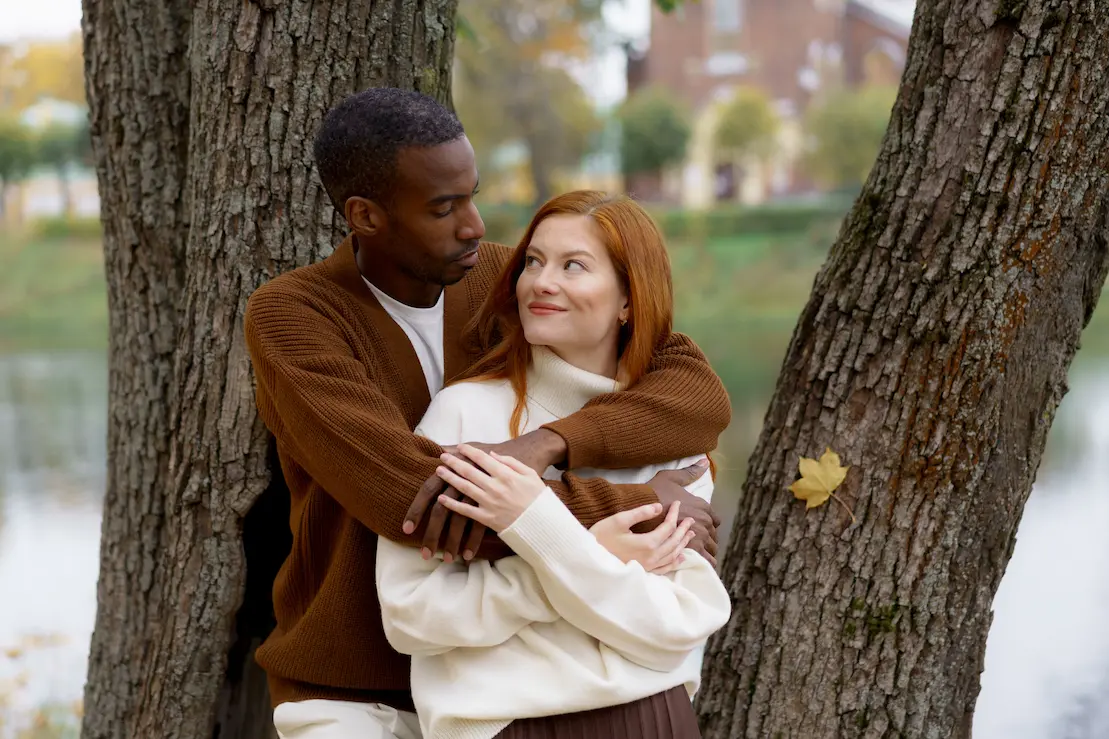 PrasadCounselingAndTraining-Couple-hugging-behind-a-tree Couple hugging behind a tree